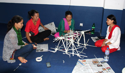 Nepali women working on a craft project at National Bethel Academy